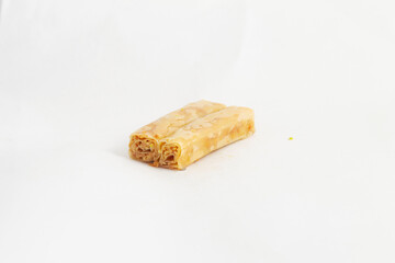 Middle eastern, Turkish sweet pastry baklava with pistachio isolated on white background
