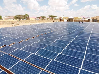 Tuinposter solar hybrid power plant in somalia, africa - drone aerial photo © Sebastian