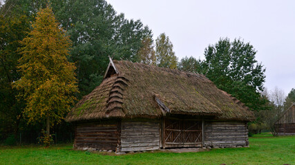 Plakat wooden barns from Podlasie in the vicinity of the city of Białystok in Podlasie in Poland