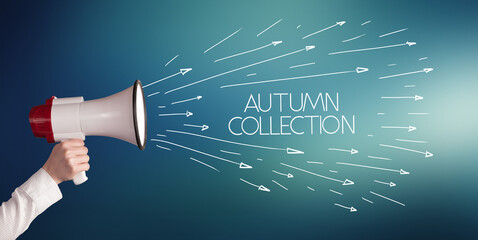 Young girl screaming to megaphone with AUTUMN COLLECTION inscription, shopping concept