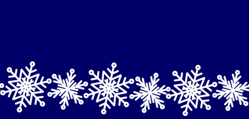 Seamless border with white snowflakes on blue - element for natural and holiday winter design