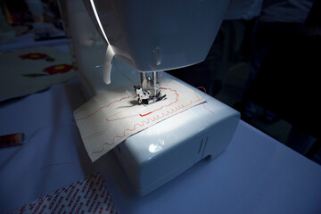 sewing machine with a needle