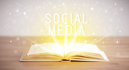 Open book with SOCIAL MEDIA inscription, social media concept