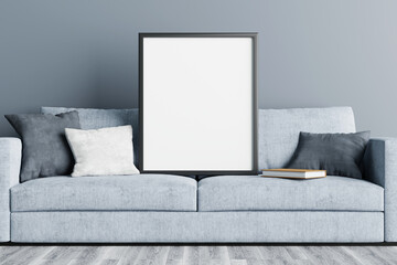 Empty frame on sofa in living room, 3d rendering