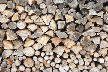 wall firewood, Background of dry chopped firewood logs in a pile
