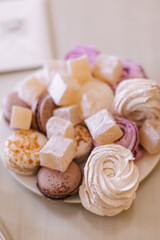 close-up of a plate of different desserts in wedding day.