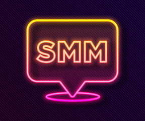 Glowing neon line SMM icon isolated on black background. Social media marketing, analysis, advertising strategy development. Vector.