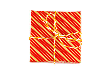 Box with gifts in festive packaging on a white background, top view.