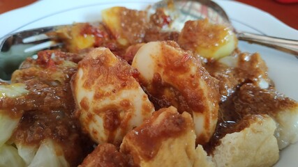 siomay. traditional indonesian food with peanut sauce. dumpling