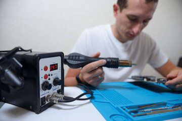 Soldering station with LED display, heating control regulator, with hot air gun and soldering iron....