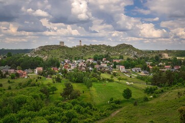 Green rural landscape. Ruins of Olsztyn Castle in Poland.
