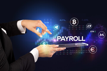 Close-up of a touchscreen with PAYROLL inscription, business opportunity concept