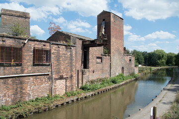 Fototapeta na wymiar A pottery in Stoke-on-Trent on the side of a canal.