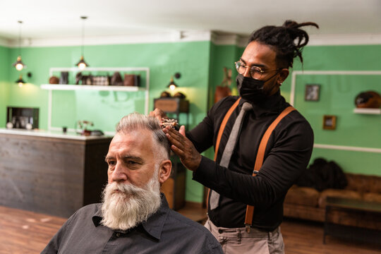 African American Barber With Mask Coronavirus Pandemic Prevention Comb White Caucasian Male With White Beard