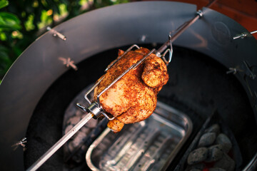 Grillhuhn am Drehspieß