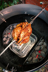 Grillhuhn am Drehspieß