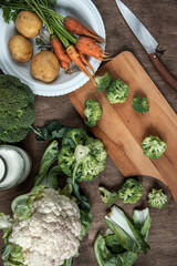 Ingredients for making broccoli soup. Top view. Vertical