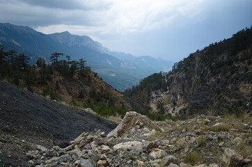 Hiking trail in the Turkish mountains, Extreme terrain on the Lycian Way. Panoramic view to the mountain range and valley. Turkey.