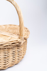 Close-up of basket wicker on isolated white background.