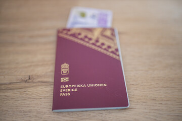 European Union, Sweden Passport with a 20 Swedish Kronor Banknote Inside