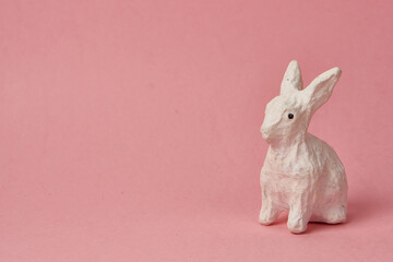 Easter bunny on a pink background toy animal holidays