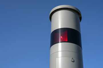 Part of a stationary speed limit enforcement with light radar, red flash and camera, traffic...