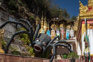 Staute of a spider at the entrance of the Pindaya cave