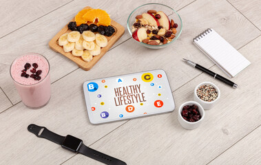 Healthy Tablet Pc compostion with HEALTHY LIFESTYLE inscription, weight loss concept