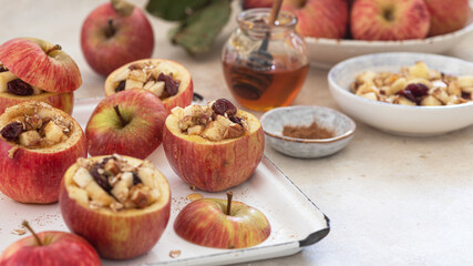 Baked apples stuffed with walnuts, cranberries and granola
