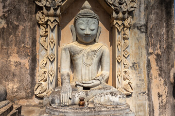 Ancient buddha statue at pagoda field in Sagar