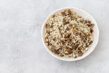 Vegetarian Mujaddara-Rice with Lentils and Turmeric. Traditional Arabic , Israeli food