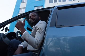 happy African American in the car © vilma3000