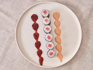 Fresh sushi rolls on a plate