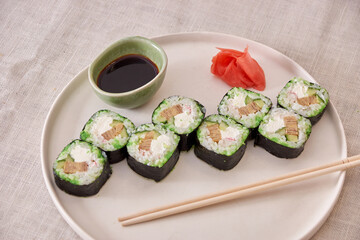 Fresh sushi rolls on a plate