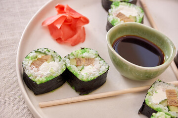 Fresh sushi rolls on a plate