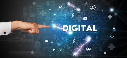 Hand pointing at DIGITAL inscription, modern technology concept
