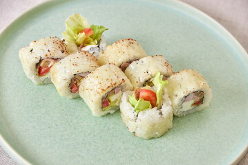 Fresh sushi rolls on a plate