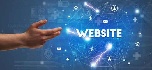 Hand pointing at WEBSITE inscription, modern technology concept
