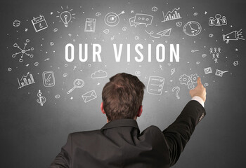 Rear view of a businessman with OUR VISION inscription, modern business concept