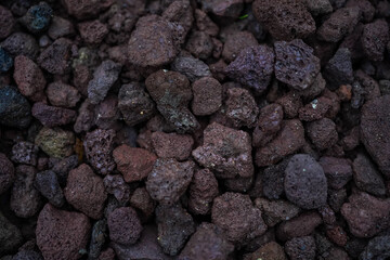 pebbles background in burgundy and purple color