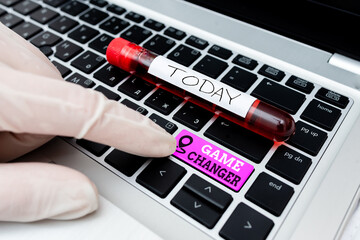 Conceptual hand writing showing Game Changer. Concept meaning Sports Data Scorekeeper Gamestreams Live Scores Team Admins Colored PC keyboard key With Accessories on Empty background