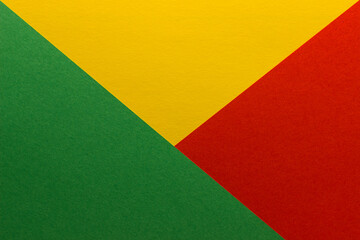 Beautiful multicolored background of yellow, green and red blank paper sheets with fine texture, close up.