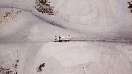 Aerial view on a truck loaded with lime at quarry factory.
