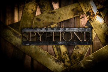 Spyphone text message on vintage textured grunge copper and gold background