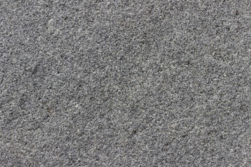 The texture of a natural stone slab from polished granite.