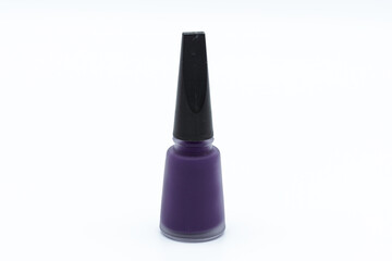 bottle of colored nail polish on white background