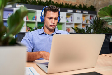 Businessman is sitting at the desk