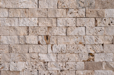 Abstract textural background of decorative brick. Textured wallpaper. Copy Space.
