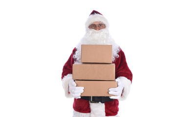 Senior man wearing a traditional Santa Claus costume holding a stack of cardboard boxes ready for delivery.  Isolated on white.