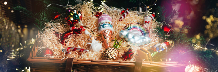 Box of Unusual Modern Christmas Baubles such as ice cream, rainbow, cat, balloon dog, pineapple, candy cane, nutcracker